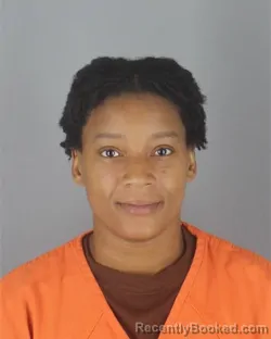 Mugshot of Jasmine Sharonecia Whitaker booked in Hennepin County, Minnesota on August 26, 2026