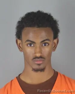 Mugshot of Kalid Abdulrahman Abdullahi booked in Hennepin County, Minnesota on August 26, 2026