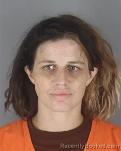 Mugshot of Alexsia Brina Miller booked in Hennepin County, Minnesota on August 26, 2026