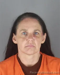 Mugshot of Theresa Marie Melton booked in Hennepin County, Minnesota on August 26, 2026