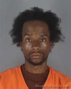 Mugshot of Dominique Lionel Greenhow booked in Hennepin County, Minnesota on August 27, 2026