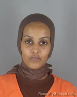Mugshot of Amal Ahmed Hassan booked in Hennepin County, Minnesota on August 27, 2026