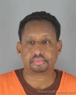 Mugshot of Mohamed Abdi Jama booked in Hennepin County, Minnesota on August 28, 2026
