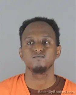 Mugshot of Zakariya Abdulahi Mire booked in Hennepin County, Minnesota on August 28, 2026