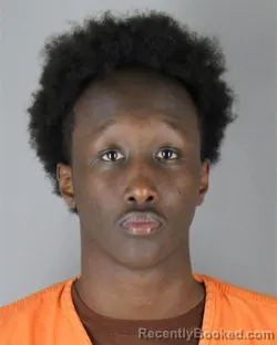 Mugshot of Abdirashid Abdiaziz Hassan booked in Hennepin County, Minnesota on August 28, 2026