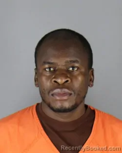 Mugshot of Reuben Mandera Okemwa booked in Hennepin County, Minnesota on August 28, 2026