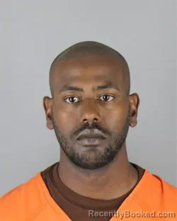 Mugshot of Moti Dugassa Abdissa booked in Hennepin County, Minnesota on August 28, 2026