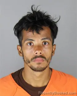 Mugshot of Bryam Edgardo Santiago booked in Hennepin County, Minnesota on August 28, 2026