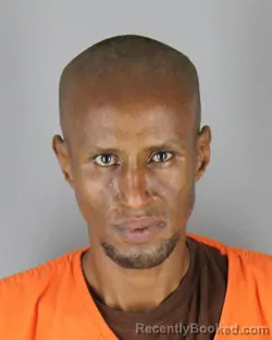 Mugshot of Ahmed Mohamed Abdi booked in Hennepin County, Minnesota on August 28, 2026