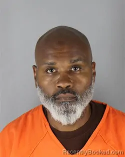 Mugshot of Tommy Lashun Holmes booked in Hennepin County, Minnesota on August 28, 2026