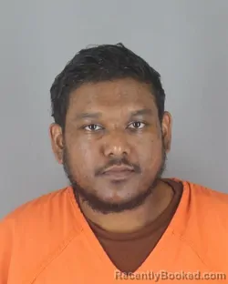 Mugshot of Jonathan Samuel Khan booked in Hennepin County, Minnesota on August 28, 2026