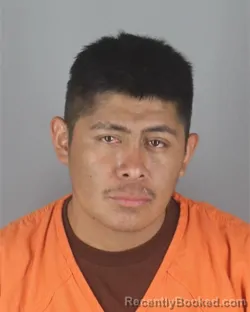 Mugshot of Gilmar Nehemias Cinto Galindo booked in Hennepin County, Minnesota on August 29, 2026