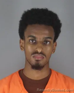 Mugshot of Mohamed Ahmed Bashir booked in Hennepin County, Minnesota on August 29, 2026