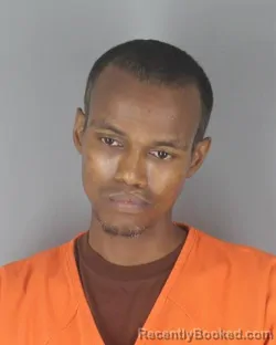 Mugshot of Guled Mahamoud Hussein booked in Hennepin County, Minnesota on August 29, 2026