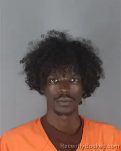 Mugshot of Mahamud Hassan Mahamed booked in Hennepin County, Minnesota on August 29, 2026