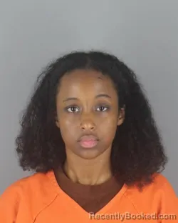 Mugshot of Aisha Abdirahman Adan booked in Hennepin County, Minnesota on August 29, 2026