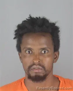 Mugshot of Guled Mohamed Ali booked in Hennepin County, Minnesota on August 29, 2026