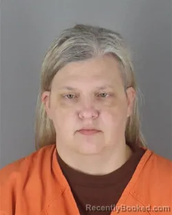 Mugshot of Jennifer Deann Stack booked in Hennepin County, Minnesota on August 29, 2026