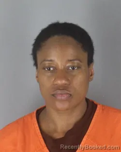 Mugshot of Anthonia Olusola Sere booked in Hennepin County, Minnesota on August 29, 2026