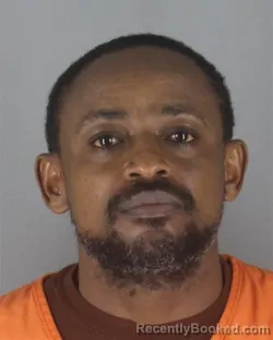 Mugshot of Anthony Macharia Maina booked in Hennepin County, Minnesota on August 30, 2026