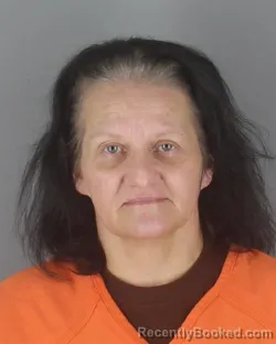 Mugshot of Pam Marie Scholastica Kieger booked in Hennepin County, Minnesota on August 31, 2026