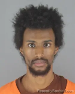 Mugshot of Abdirahman Mahamed Hassan booked in Hennepin County, Minnesota on August 31, 2026