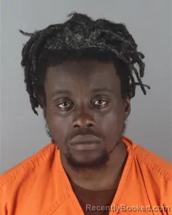 Mugshot of Trokon Daniel Kpasie booked in Hennepin County, Minnesota on August 31, 2026