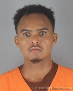 Mugshot of Hussein Ali Mohamed booked in Hennepin County, Minnesota on August 31, 2026