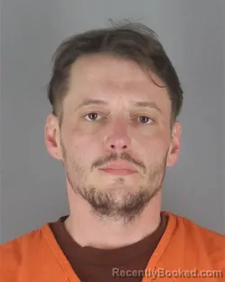Mugshot of Travis Edward Stahoski booked in Hennepin County, Minnesota on August 31, 2026