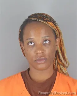 Mugshot of Ninsiima Frida Mwombeki booked in Hennepin County, Minnesota on September 1, 2026