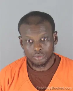 Mugshot of Dahir Yussuf Aden booked in Hennepin County, Minnesota on September 1, 2026