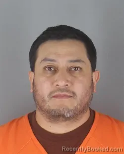 Mugshot of Danilo Alexander Cajas Ramirez booked in Hennepin County, Minnesota on September 4, 2026