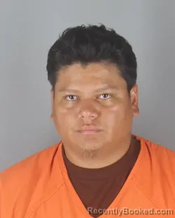 Mugshot of Eduin Edgardo Cruz Avila booked in Hennepin County, Minnesota on September 4, 2026