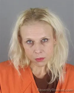 Mugshot of Kristin Michelle Dennison booked in Hennepin County, Minnesota on September 5, 2026