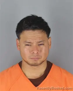 Mugshot of Enrique Rosas Lopez booked in Hennepin County, Minnesota on September 27, 2026