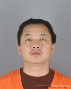 Mugshot of John Yee Leng Fang booked in Hennepin County, Minnesota on September 27, 2026