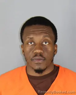 Mugshot of Tshibola Benjamin Ngoyi booked in Hennepin County, Minnesota on September 27, 2026