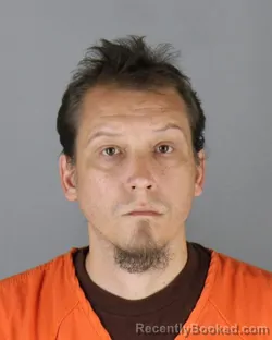Mugshot of Jason Allan Perkins booked in Hennepin County, Minnesota on September 28, 2026