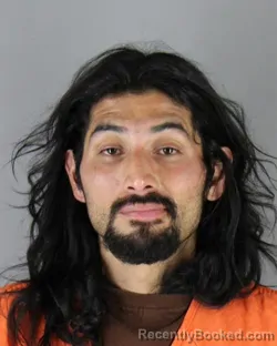 Mugshot of Giovanni Antwan Garcia-Rodriguez booked in Hennepin County, Minnesota on September 29, 2026