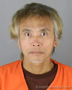Mugshot of Cuong Minh Le booked in Hennepin County, Minnesota on September 30, 2026