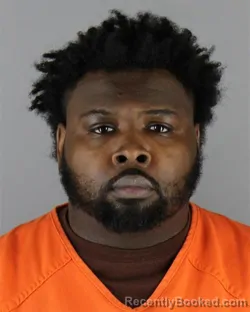 Mugshot of George Kohila Ndifor Chomilo booked in Hennepin County, Minnesota on September 30, 2026