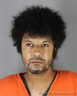 Mugshot of Julian Antonio Madson booked in Hennepin County, Minnesota on September 30, 2026