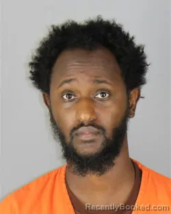 Mugshot of Muhyadin Abdiwali Hussein booked in Hennepin County, Minnesota on September 30, 2026