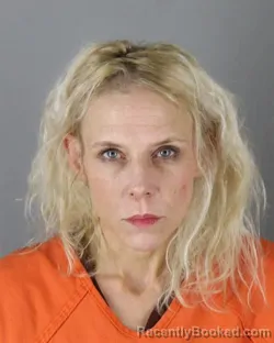 Mugshot of Kristin Michelle Dennison booked in Hennepin County, Minnesota on October 1, 2026