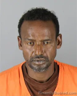 Mugshot of Harun Abdirizak Abdi booked in Hennepin County, Minnesota on October 1, 2026