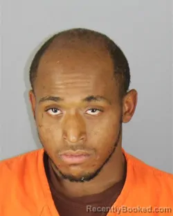Mugshot of Omar Patrick Feigh booked in Hennepin County, Minnesota on October 1, 2026