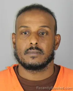 Mugshot of Yasin Mohamud Elmi booked in Hennepin County, Minnesota on October 1, 2026