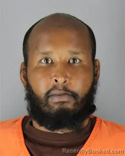 Mugshot of Abdikarin Bashir Mahamed booked in Hennepin County, Minnesota on October 2, 2026