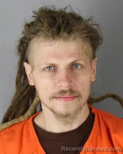 Mugshot of Daniil Sergeyvich Lelyukh booked in Hennepin County, Minnesota on October 2, 2026