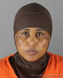 Mugshot of Muna Ahmed Abdi booked in Hennepin County, Minnesota on October 2, 2026